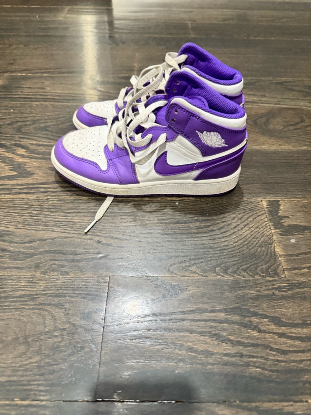 Nike Air Jordans Purple and White High-Top Sneakers